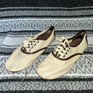 Toms cream and brown shoes